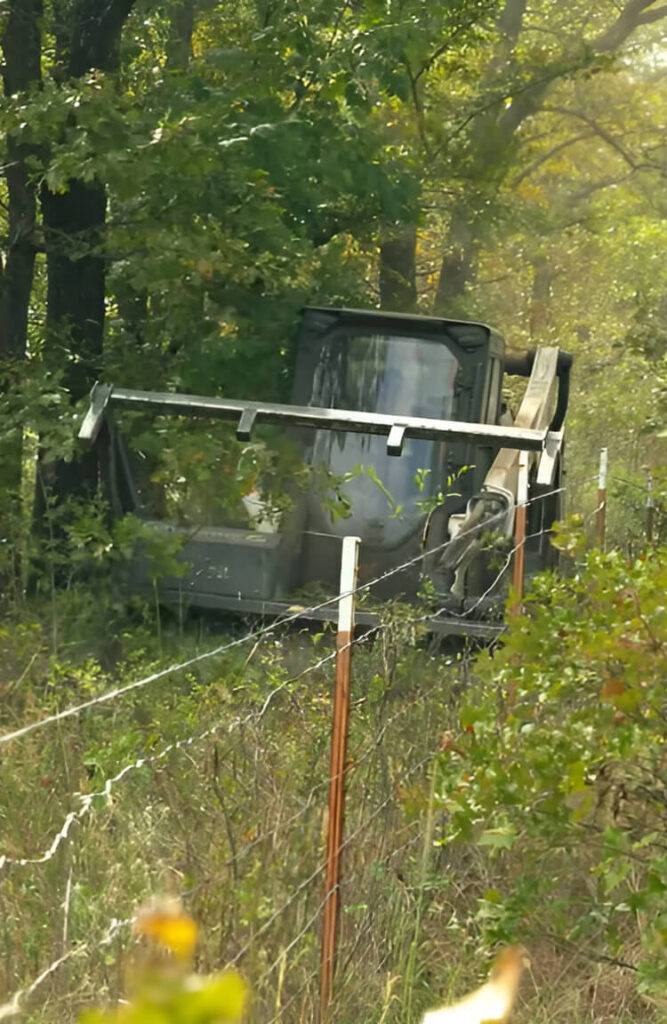 Commercial land and brush clearing service using a mulcher to prepare a lot for development in Ocean County, NJ.